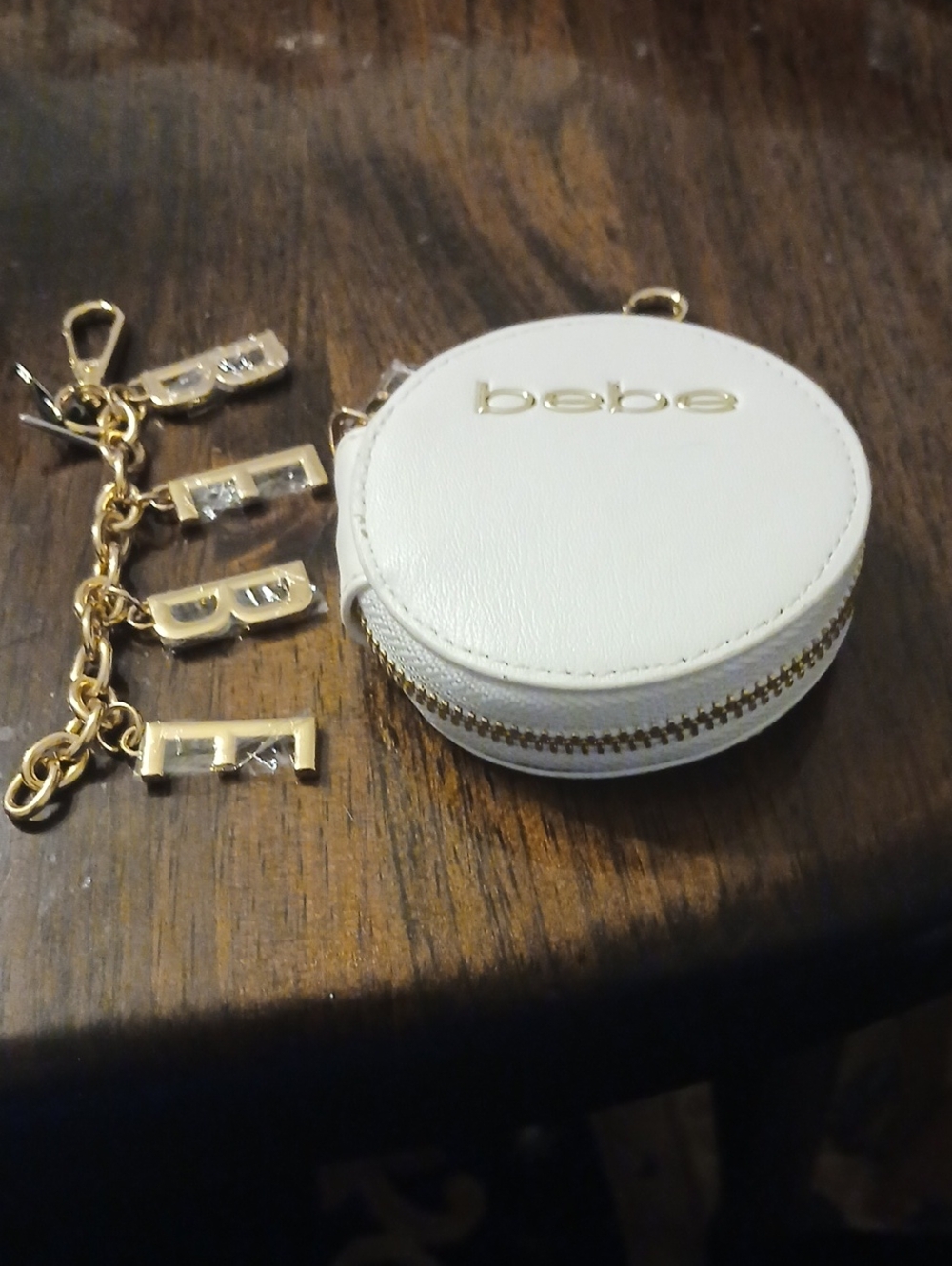 bebe White Round Zip Coin Pouch with Gold Logo Charm Key Chain
